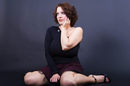 Angelique kneeling sideways