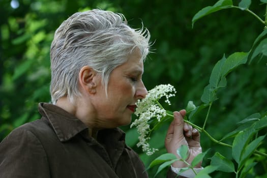 white-haired woman in her 50s