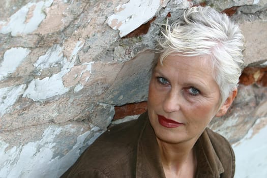 white-haired woman in her 50s