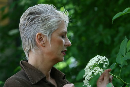 white-haired woman in her 50s