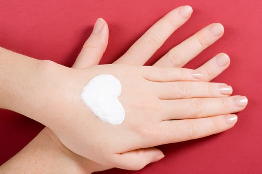 Cream heart on the back of the hand