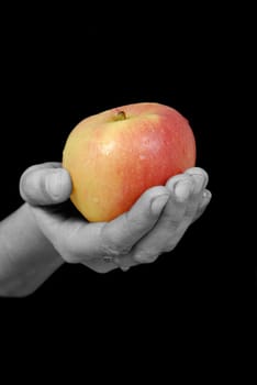 Hand with apple