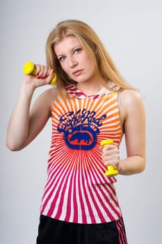 Franziska with dumbbells eye contact