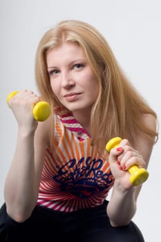 Franziska with dumbbells close up