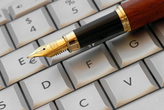 Pen rests on keyboard