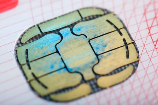 Severely worn money chip on card