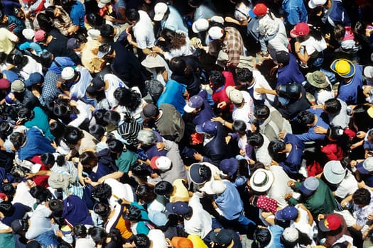 Crowds of worshippers during the Good Friday procession in Quito/Ecuador in scorching heat. On Good Friday,for example,the revelers parade through the city for several hours.