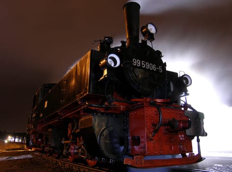 This magnificent Mallet locomotive is about 100 years old! On the left in the picture a modern Regiotram. Recorded in Wernigerode.