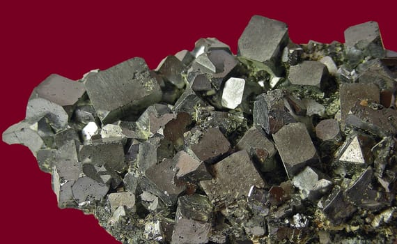 Galena or galena often shows crystals of perfect cube shape. Chemically,this mineral is lead(II) sulfide (formula: PbS). Galena can contain up to one percent silver. Galena is considered one of the first minerals,since