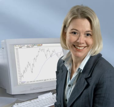 friendly office worker in front of PC