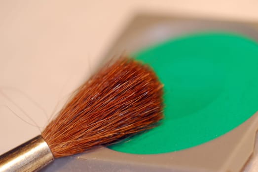 green with brush