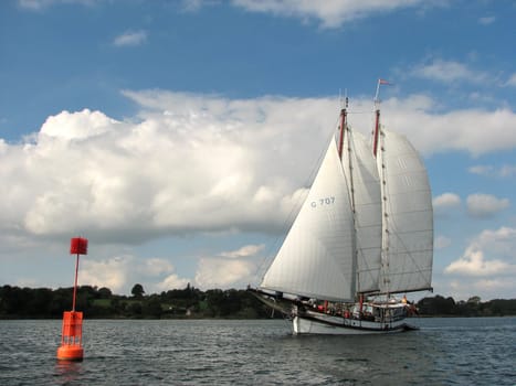With full sails