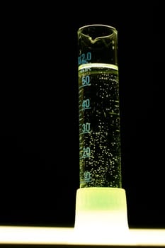 Measuring cylinder illuminated