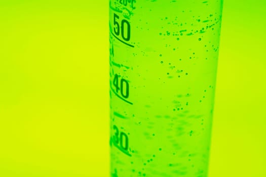 Green measuring cylinder