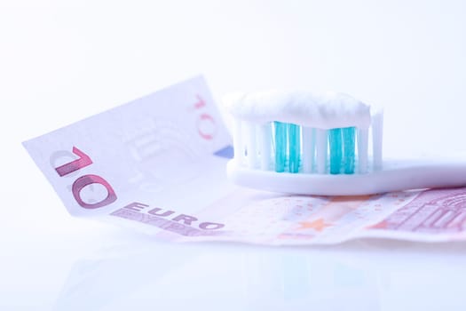 Toothbrush on banknote