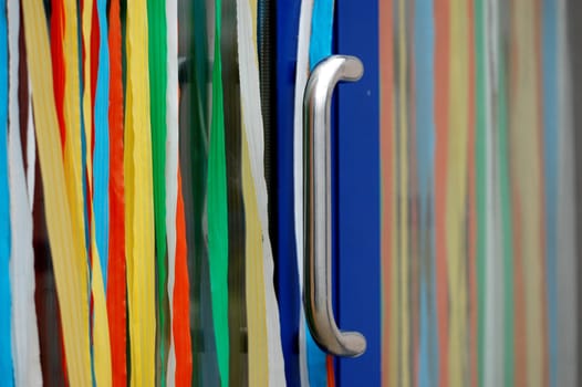 Door with colorful curtain