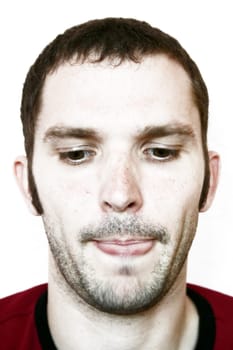 Man,unshaven,looking down