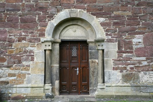 Side portal of the Romanesque St. Kilian's Church in Lügde (Lippe district,North Rhine-Westphalia)