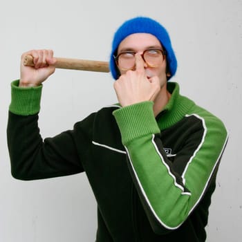 Crazy man with cane