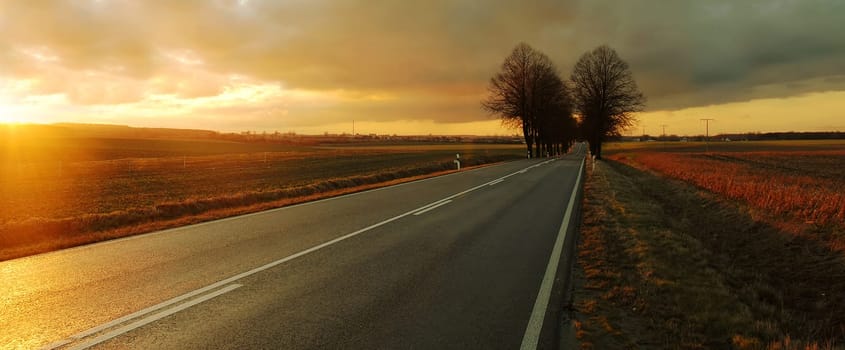 I tried again,after your hint,to cut the picture differently...! Thank you for that! But I'm not so sure if something can get away from the road in front!:-)