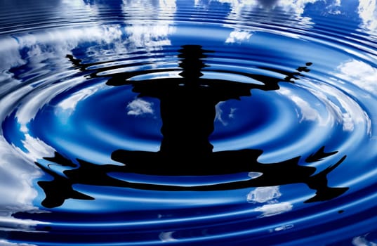 flying boy - water reflection