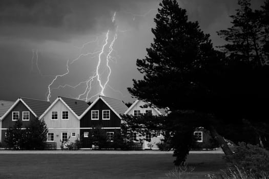 Houses with thunderstorms