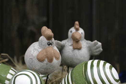 Ceramic chickens with ceramic eggs