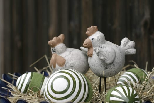 Ceramic chickens with ceramic eggs