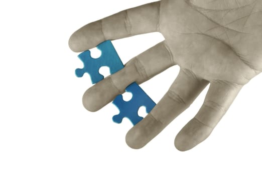Hand with puzzle
