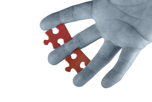 Hand with puzzle