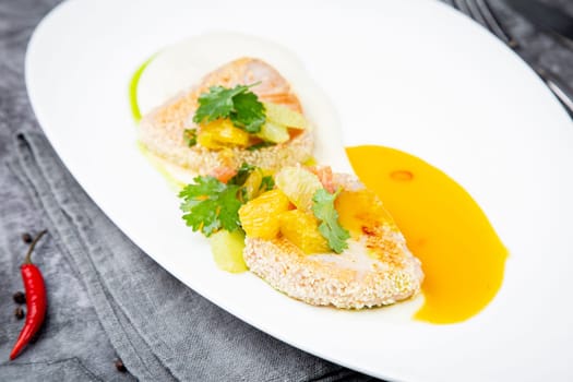 fish with tangerines, parsley and sesame breaded