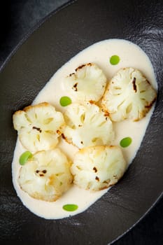 cooked cauliflower in mushroom sauce