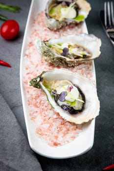 fresh oysters on red sea salt