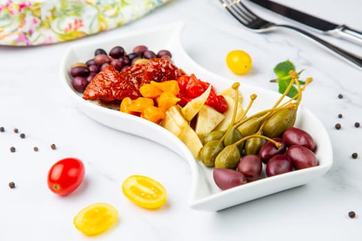 assorted nuts and dried vegetables on a light background