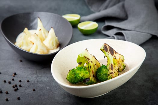 cooked cauliflower in mushroom sauce and broccoli