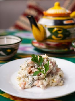 Olivier salad according to the Russian recipe. Asian style. High quality photo