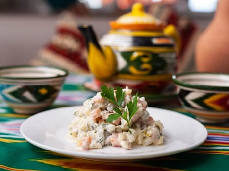 Olivier salad according to the Russian recipe. Asian style. High quality photo