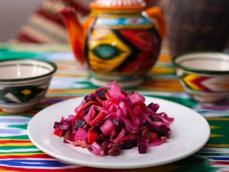 Venigret salad - beets, potatoes, onions and sauerkraut. Asian style. High quality photo