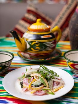 Creamy salad of green and red peppers, cheese, eggplant, onions and tomatoes Asian style. High quality photo