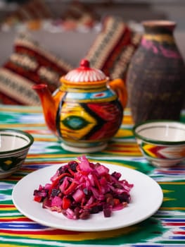 Venigret salad - beets, potatoes, onions and sauerkraut. Asian style. High quality photo