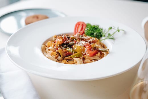 udon noodles with sesame seeds and herbs