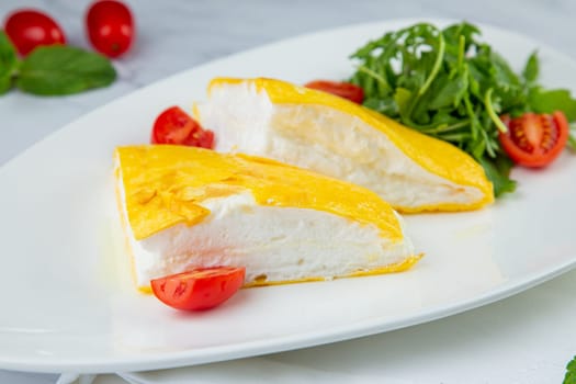 French tall omelette with arugula and cherry tomatoes