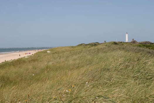 Dune landscape with lighthouse