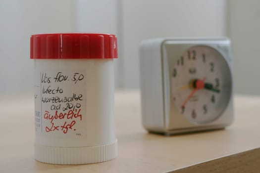 Ointment box with alarm clock