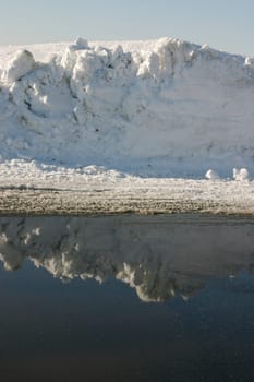 Iceberg reflecting in the water