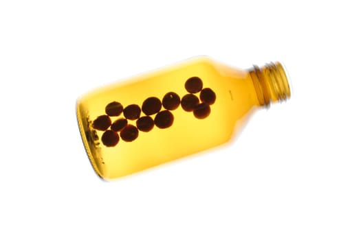 Tablets in glass bottle