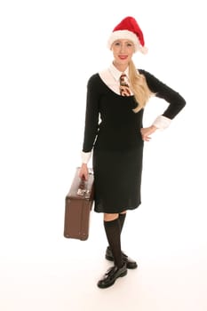 Young woman with pointed cap and suitcase