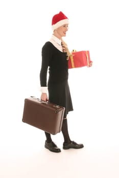 Young woman with pointed cap and suitcase