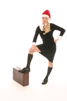 Young woman with pointed cap and suitcase