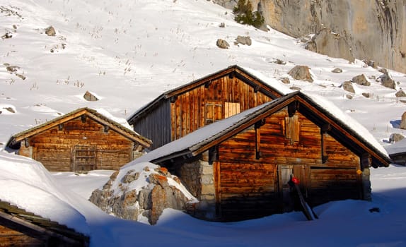 Alpine huts in winter